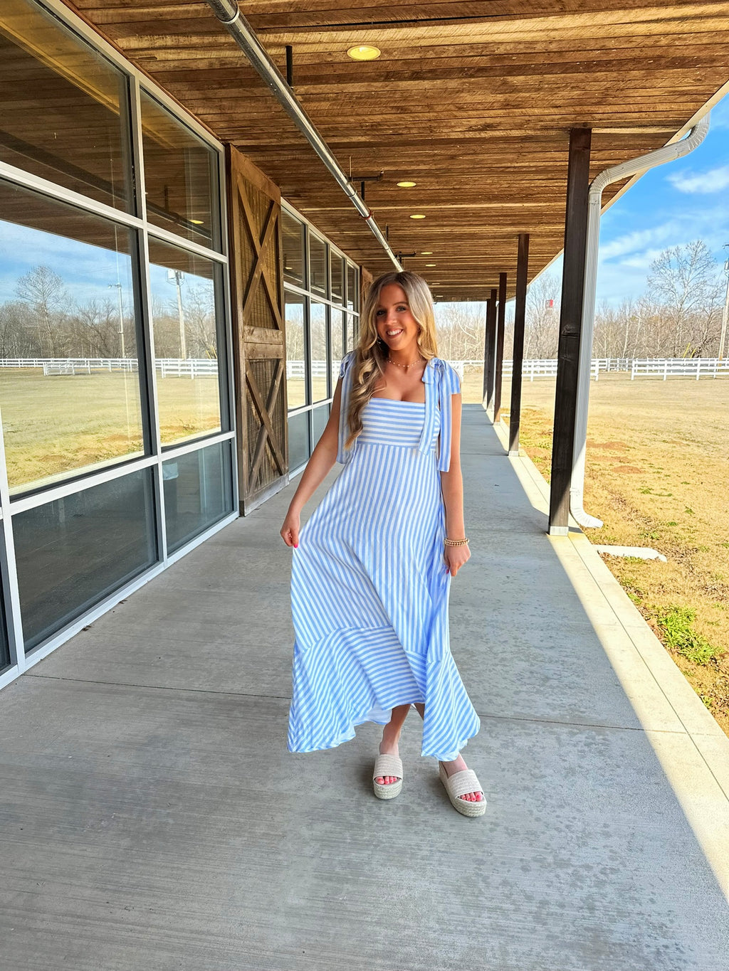 Blue and white striped flowy dress spring 2025 fashion perfect for baby shower easter dress 
