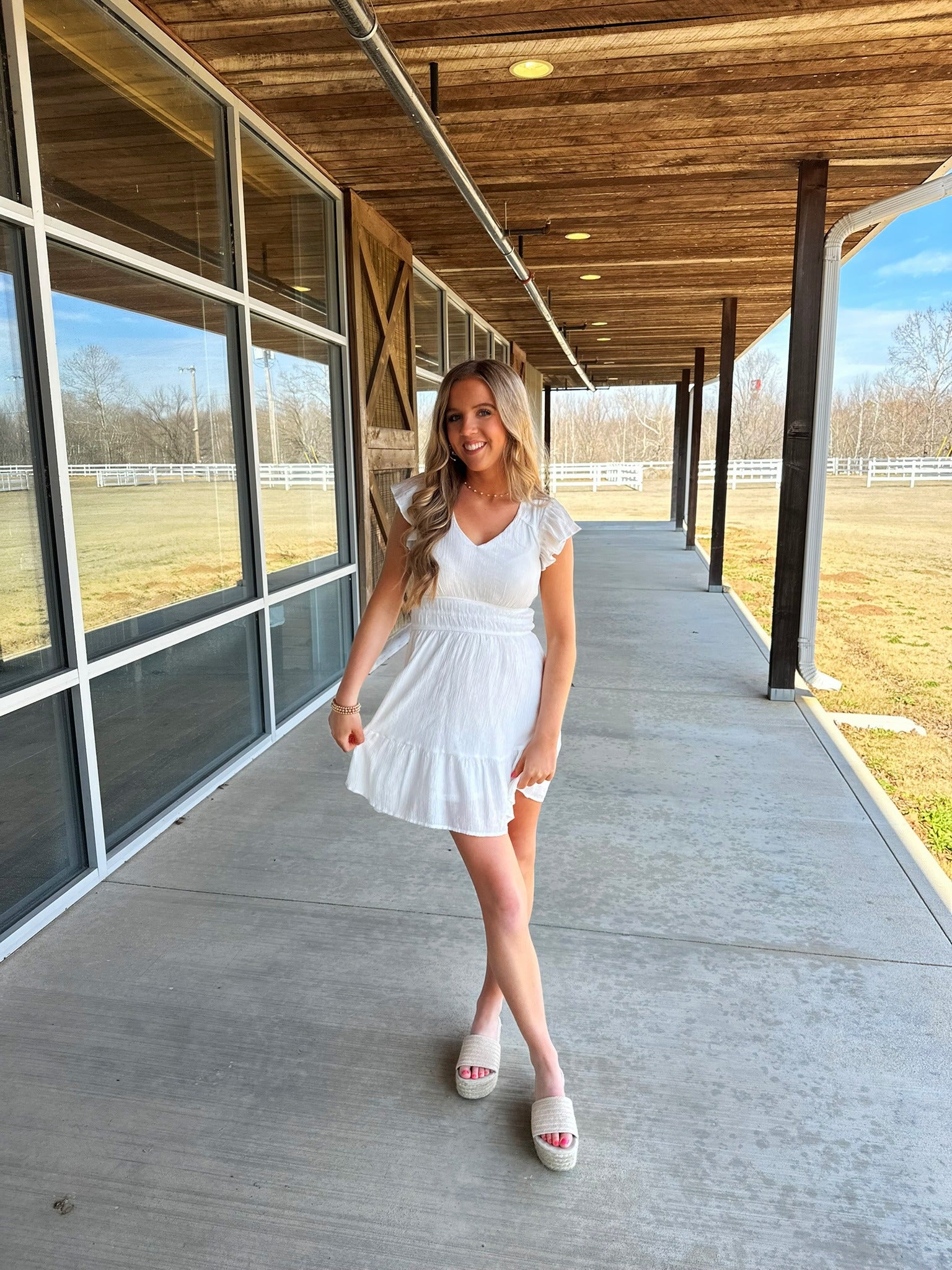White cinch waisted dress classy for spring 2025